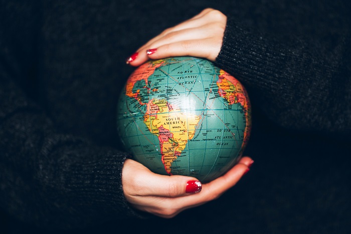 globe in hands